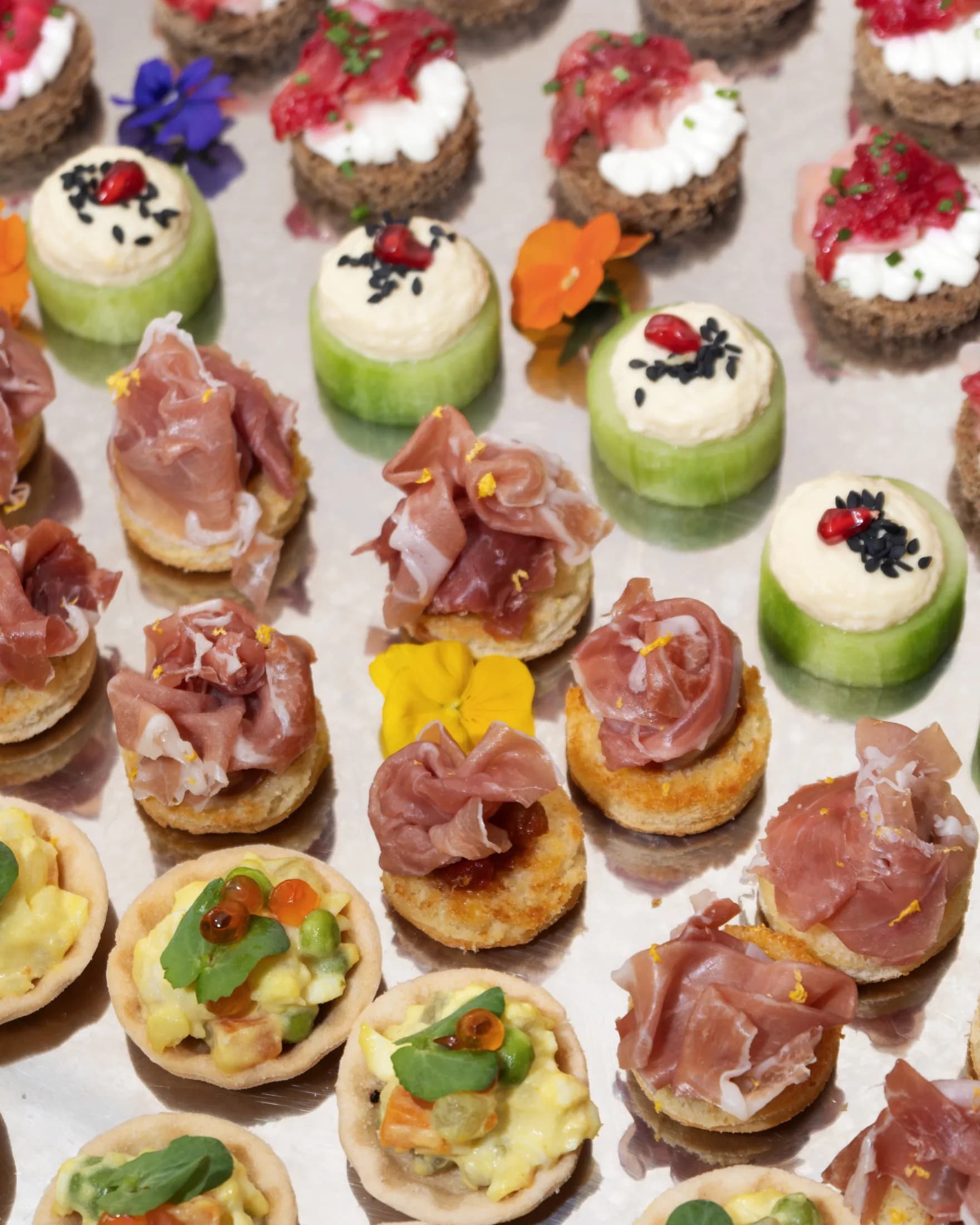 A full tray of ZIMA canapés