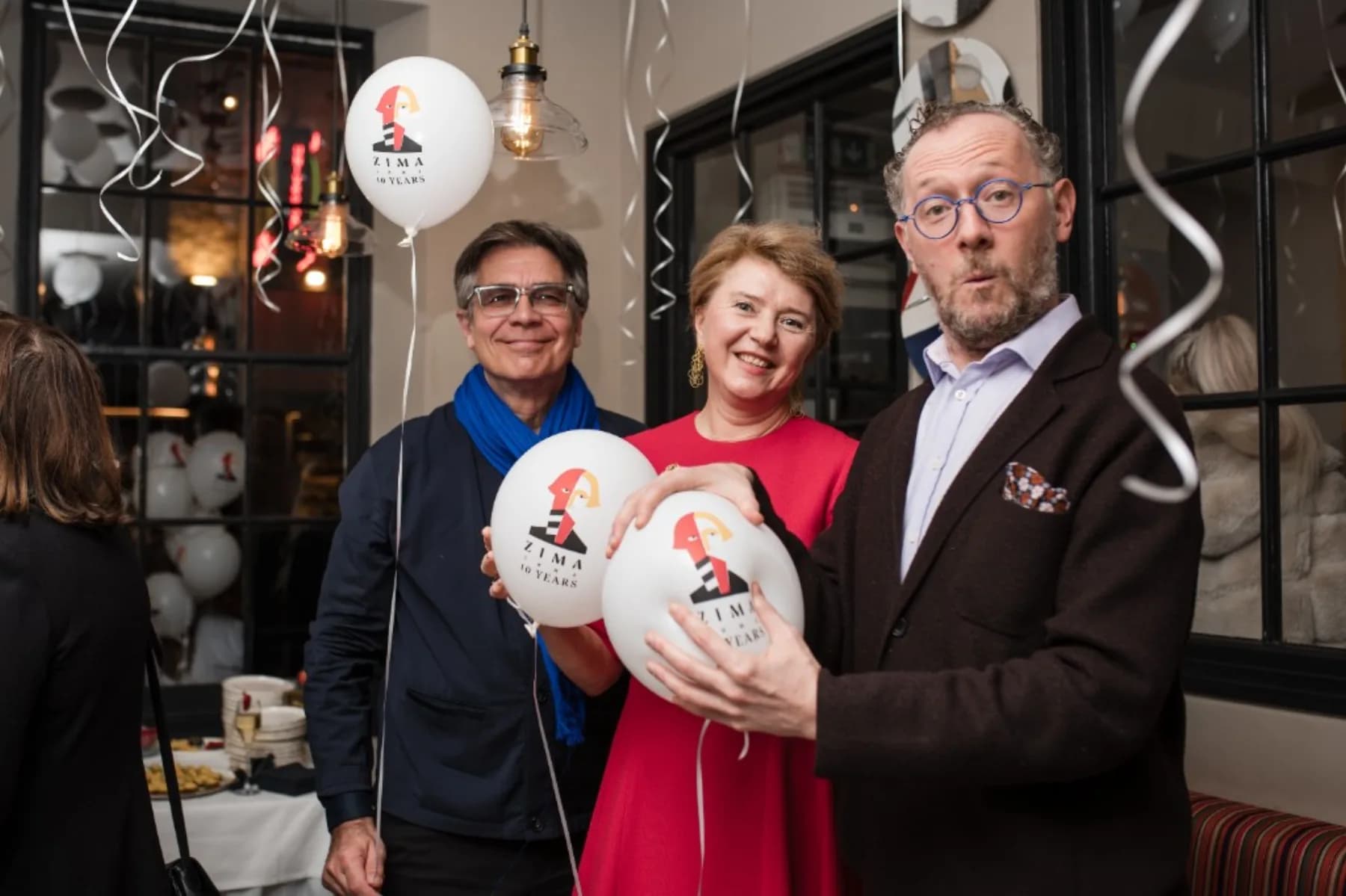 A celebration downstairs at ZIMA