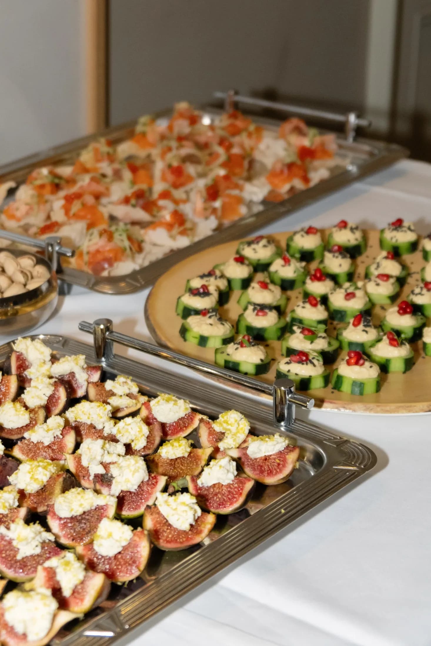 ZIMA catering trays — figs, cucumber canapés and smoked fish