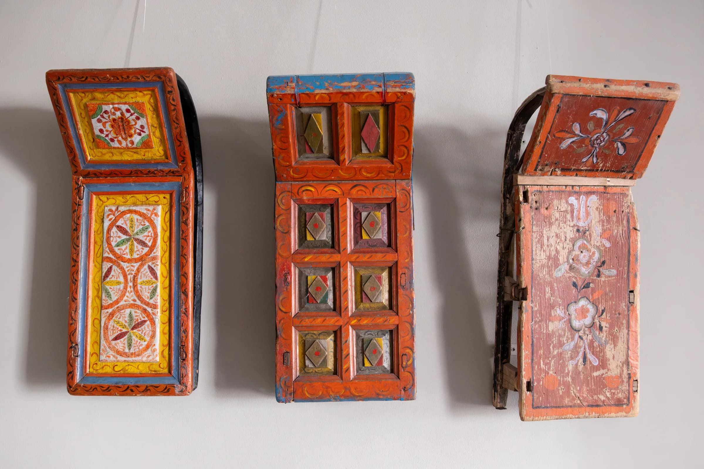 Painted folk art panels above the first-floor banquette